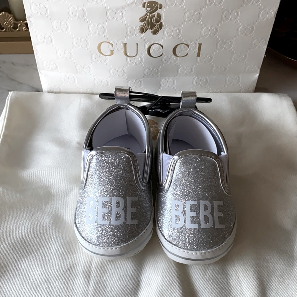 Bebe baby moccasins style of shoe.